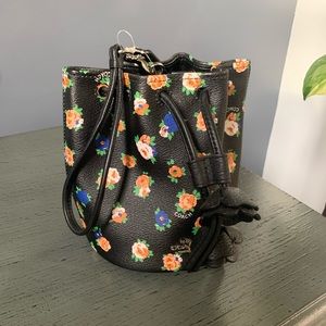 Coach black and floral print wristlet